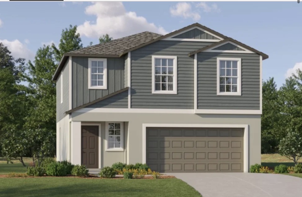 Two-story gray-and-white residential home with attached two-car garage